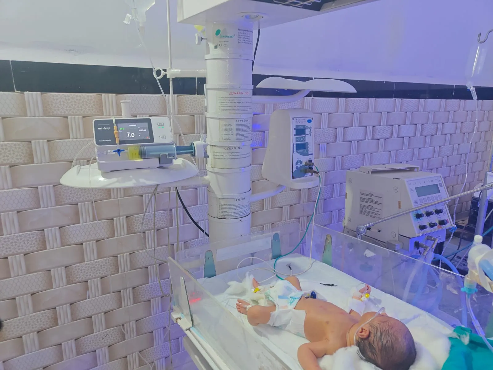 Newborn Care in NICU Incubator